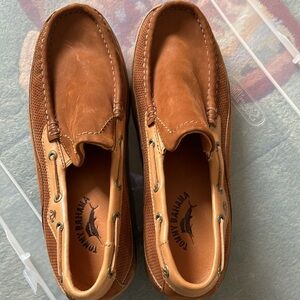 Tommy Bahama slip on brown suede shoes.